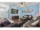 Spacious living room with plush leather sofas, a media center, and a cozy atmosphere at 1325 Seburn Rd, Apopka, FL 32703