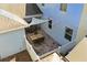 Aerial view of private patio with shade sail, barbecue, and outdoor seating area at 1325 Seburn Rd, Apopka, FL 32703