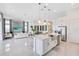 Elegant living area flows into a modern kitchen, featuring sleek furnishings, and modern decor at 13346 Alderley Dr, Orlando, FL 32832