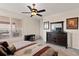Neutral bedroom with ceiling fan, carpet, dresser and furnishings with natural light at 14500 Black Quill Dr, Winter Garden, FL 34787