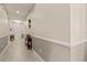 View of the hallway featuring neutral paint tones and a decorative console table at 14500 Black Quill Dr, Winter Garden, FL 34787