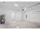 Spacious two-car garage featuring an updated water heater and clean, bright interior ready for customization at 14750 Sw 63Rd Ter, Ocala, FL 34473