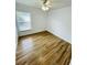 Bedroom featuring tile floors, white walls, and a window with blinds at 1600 Riveredge Rd, Oviedo, FL 32766