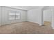 Cozy bedroom with carpet, a window, and neutral walls to give it a calm aesthetic at 16140 Yelloweyed Dr, Clermont, FL 34714