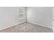 Bedroom with neutral walls, soft carpet, and a sunlit window at 16140 Yelloweyed Dr, Clermont, FL 34714