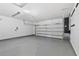 Spacious two-car garage with a clean and organized interior at 16140 Yelloweyed Dr, Clermont, FL 34714