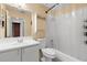 Bathroom features single sink vanity, toilet, shower-tub, and cabinets for storage at 1669 Slash Pine Pl, Oviedo, FL 32765