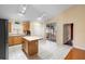 Spacious kitchen with island, stainless steel appliances, and sliding glass doors at 1669 Slash Pine Pl, Oviedo, FL 32765