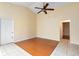 Bright living room features wood floor and neutral colored walls at 1669 Slash Pine Pl, Oviedo, FL 32765