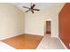 Living room boasts wood floor and neutral colored walls at 1669 Slash Pine Pl, Oviedo, FL 32765