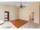 Spacious living room features wood floor and ceiling fan at 1669 Slash Pine Pl, Oviedo, FL 32765