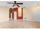 Cozy open-concept living space with neutral walls and plenty of room for furniture at 1669 Slash Pine Pl, Oviedo, FL 32765