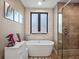 Luxurious bathroom with soaking tub, walk-in shower, and contemporary fixtures at 1970 Laurel Rd, Winter Park, FL 32789