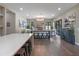 Spacious living room with modern furnishings, fireplace and seamless flow to outdoor spaces at 1970 Laurel Rd, Winter Park, FL 32789