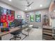 Bright office space with neutral walls and carpet, large wood desk, computer, and natural light from multiple windows at 1970 Laurel Rd, Winter Park, FL 32789