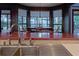 Dining area boasts waterfront views, tile floors and outdoor access at 2020 Venetian Way, Winter Park, FL 32789