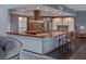 Open kitchen with wood countertops, stainless steel appliances, and updated cabinetry at 2020 Venetian Way, Winter Park, FL 32789