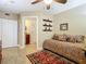 Cozy bedroom space featuring a comfortable bed and a convenient en-suite bathroom at 2055 S Atlantic Ave # 1604, Daytona Beach, FL 32118