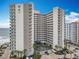 Stylish beachfront high-rise with panoramic ocean views, modern architecture, and lush landscaping at 2055 S Atlantic Ave # 1604, Daytona Beach, FL 32118