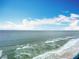 Expansive ocean view showcases clear blue skies meeting the horizon in a serene coastal setting at 2055 S Atlantic Ave # 1604, Daytona Beach, FL 32118