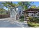 Backyard featuring a gazebo, parking area, and partial view of home at 2109 E Central Blvd, Orlando, FL 32803