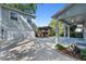 Spacious backyard featuring a wooden gazebo and private two car garage with upper level access at 2109 E Central Blvd, Orlando, FL 32803