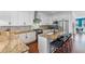 Modern kitchen featuring granite countertops, stainless steel appliances, and bar seating at 2109 E Central Blvd, Orlando, FL 32803