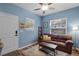 Cozy living room with comfortable seating, natural light, and wood floors, creating a welcoming atmosphere at 2109 E Central Blvd, Orlando, FL 32803