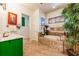 Bathroom with a soaking tub, tiled shower, green vanity and plenty of natural light at 2112 Shady Ln, Geneva, FL 32732