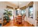 Cozy breakfast nook with water view, featuring a round table and large windows for a bright, inviting space at 2112 Shady Ln, Geneva, FL 32732