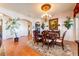 Elegant dining area with hardwood floors, chandelier lighting, and room for a large table at 2112 Shady Ln, Geneva, FL 32732