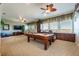 Spacious game room with a pool table, offering ample space for entertainment and relaxation at 2112 Shady Ln, Geneva, FL 32732