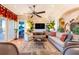 Comfortable living room featuring a ceiling fan, recessed lights, and bright natural light at 2112 Shady Ln, Geneva, FL 32732