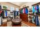 Well-organized walk-in closet with custom shelving and storage solutions, offering ample space for clothing and accessories at 2112 Shady Ln, Geneva, FL 32732