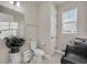 Unique bathroom featuring sleek fixtures, ample counterspace, and modern design elements at 2291 Raven Ridge Rd, Minneola, FL 34715