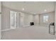 Large bonus room with plenty of space for activities and lots of natural light at 2291 Raven Ridge Rd, Minneola, FL 34715