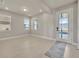 Bright living room featuring recessed lighting, lots of natural light and wood-look tile flooring at 2291 Raven Ridge Rd, Minneola, FL 34715