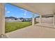 Covered patio with concrete floor provides a relaxing outdoor space with a view of the yard at 2291 Raven Ridge Rd, Minneola, FL 34715