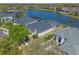 An aerial shot showcasing a home near a large pond at 2487 Ridgemoor Dr, Orlando, FL 32828