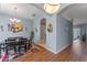Elegant dining room featuring a chandelier and seamless open-concept design at 2487 Ridgemoor Dr, Orlando, FL 32828