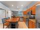 Spacious kitchen featuring granite countertops, stainless steel appliances, and center island at 2487 Ridgemoor Dr, Orlando, FL 32828