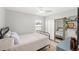 Bright bedroom with ample natural light, a comfortable bed, and minimalist decor that creates a peaceful sanctuary at 2511 Chatham Cir, Kissimmee, FL 34746