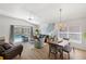 Open living space features stylish decor, a view of the pool, and plenty of natural light for comfortable living at 2511 Chatham Cir, Kissimmee, FL 34746