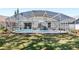 Backyard view showcasing a screened-in pool and entertainment area with a lush lawn at 2511 Chatham Cir, Kissimmee, FL 34746