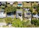 An overhead aerial view features a well manicured lawn, nearby homes, and a tree lined street at 2536 Brookshire Ave, Winter Park, FL 32792