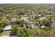 An aerial view of the neighborhood showcases tree-lined streets and manicured lawns at 2536 Brookshire Ave, Winter Park, FL 32792