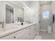 Bathroom featuring double sinks, granite countertops, and modern fixtures at 2536 Brookshire Ave, Winter Park, FL 32792