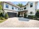 Stately two-story house featuring an attached two-car garage and welcoming entrance at 2536 Brookshire Ave, Winter Park, FL 32792