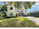 Charming two-story home with a well-manicured front lawn and basketball court at 2536 Brookshire Ave, Winter Park, FL 32792