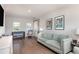 Inviting living room featuring hardwood floors, comfortable seating, and stylish decor at 2536 Brookshire Ave, Winter Park, FL 32792